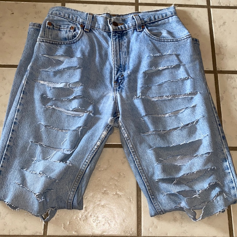 Vintage Levi 550 relaxed fit distressed tapered leg jeans